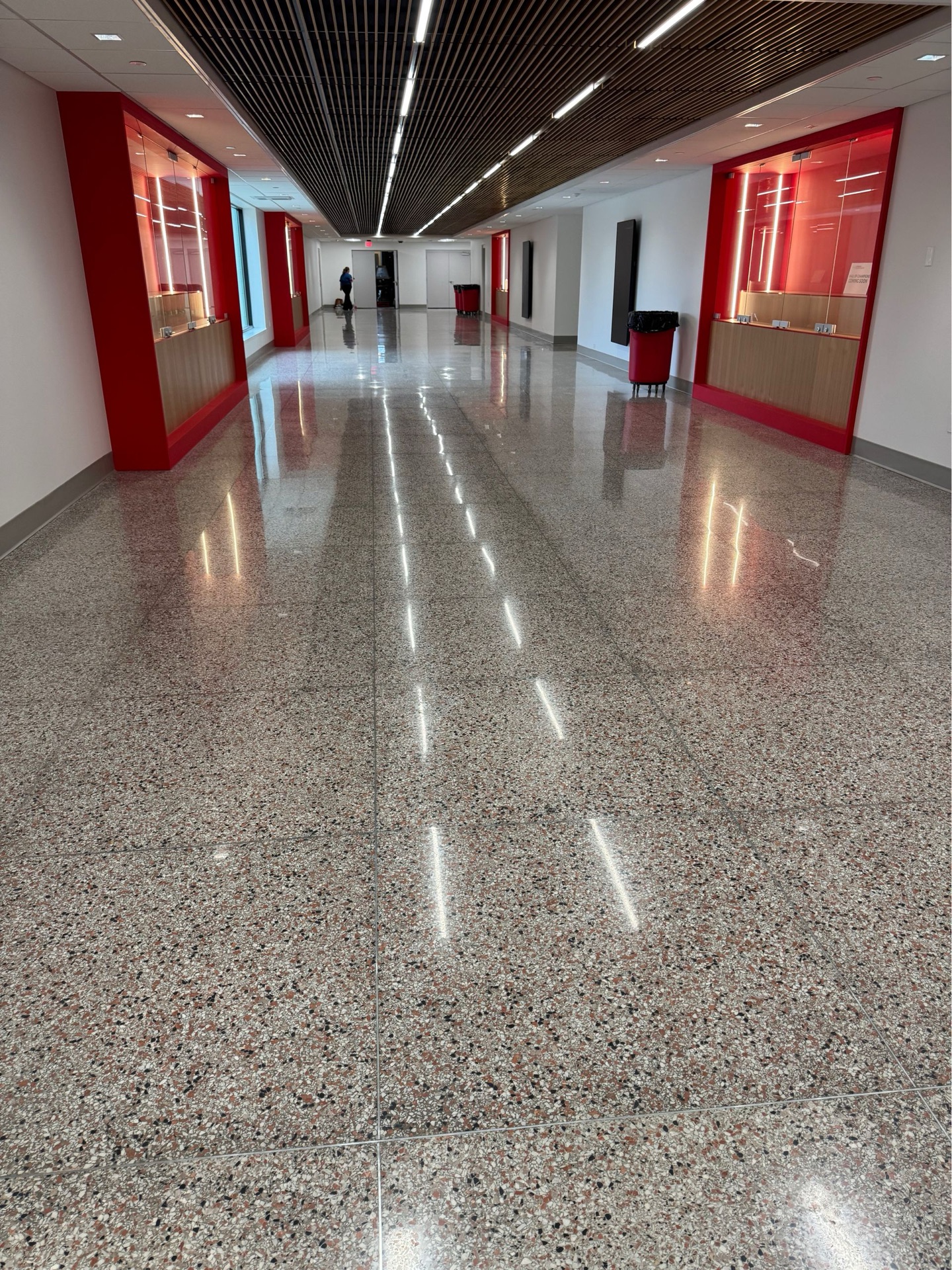 Polished concrete commercial corridor by Armor Floors Systems